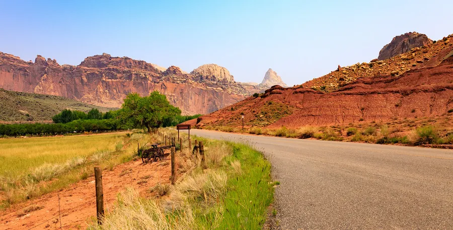 Road along Capitol Reef National Park with fences.