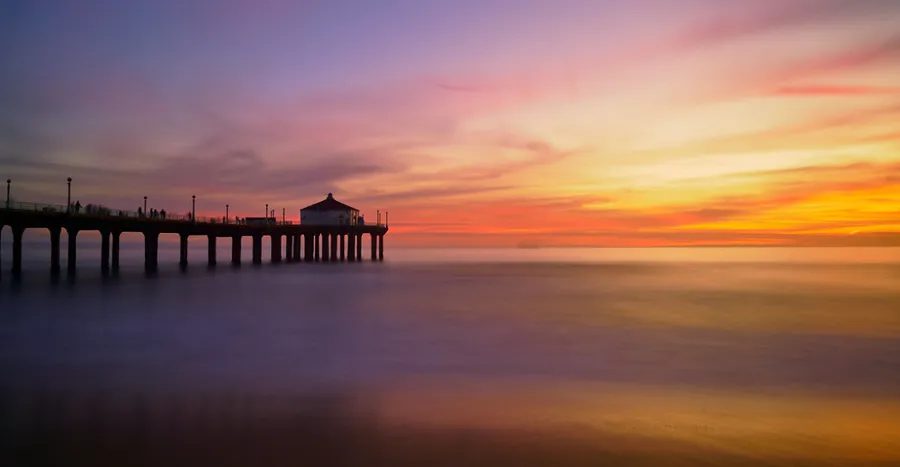 Manhattan Beach Pier in California during sunset.