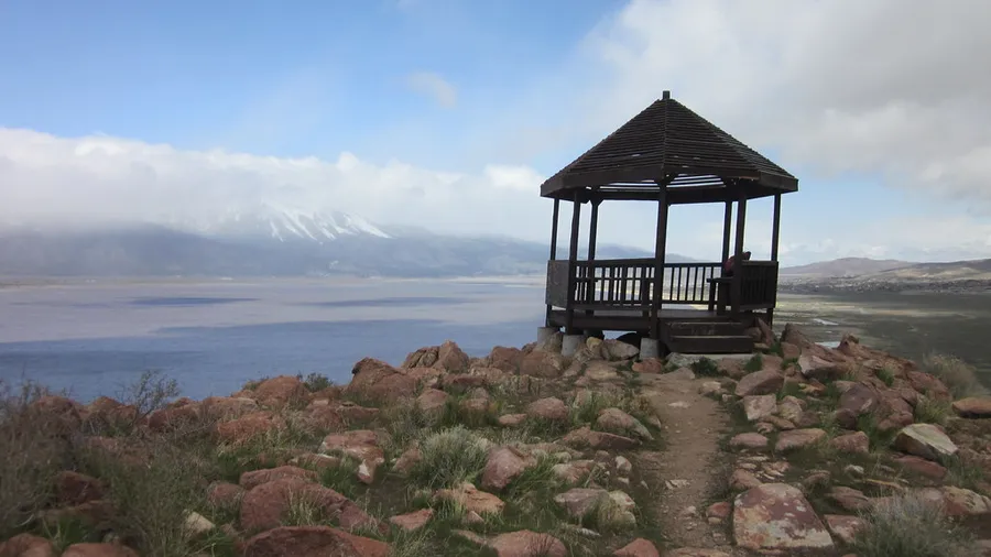 A scenic, high-altitude gazebo vantage point overlooking Washoe Lake State Park.